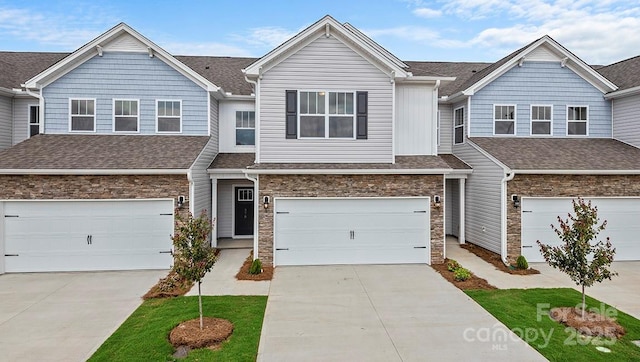 106 Sugg Trl, Weaverville, NC 28787 - multi unit property featuring an attached garage, stone siding, and concrete driveway