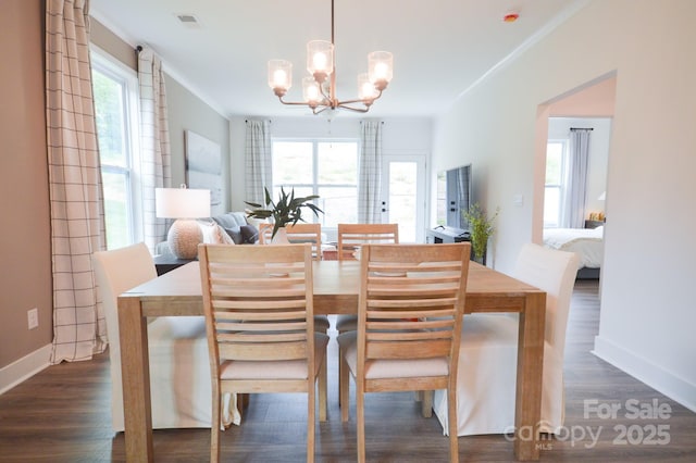 106 Sugg Trl, Weaverville, NC 28787 - dining area with a chandelier, wood finished floors, and ornamental molding