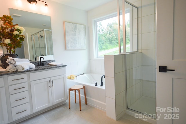 106 Sugg Trl, Weaverville, NC 28787 - bathroom with vanity, a shower stall, a bath, and tile patterned flooring