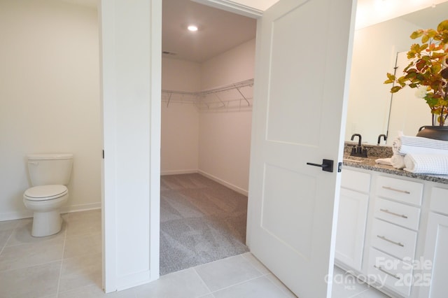 106 Sugg Trl, Weaverville, NC 28787 - bathroom featuring vanity, tile patterned flooring, a spacious closet, and recessed lighting