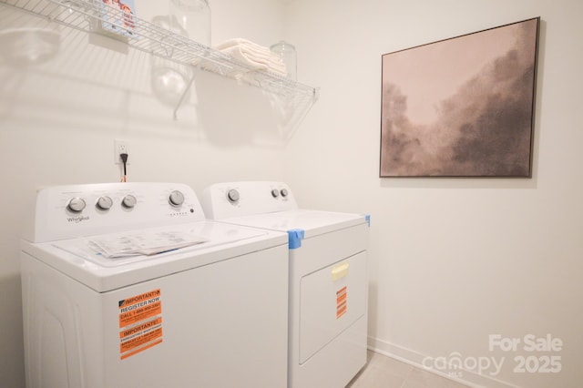 106 Sugg Trl, Weaverville, NC 28787 - laundry room with washer and clothes dryer and light tile patterned floors