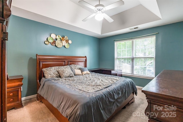 7206 Stoney Place Ct, Charlotte, NC 28262 - carpeted bedroom with baseboards, a raised ceiling, and ceiling fan