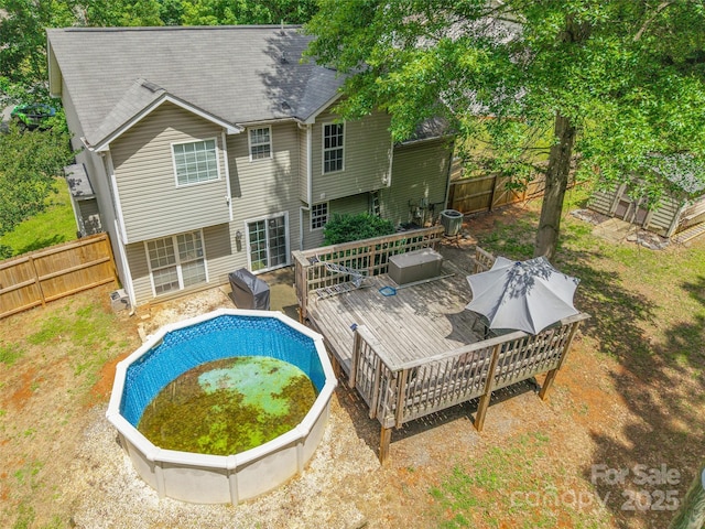 7206 Stoney Place Ct, Charlotte, NC 28262 - view of swimming pool featuring a deck and a fenced backyard