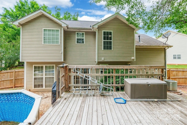 7206 Stoney Place Ct, Charlotte, NC 28262 - rear view of property with a deck, cooling unit, and fence