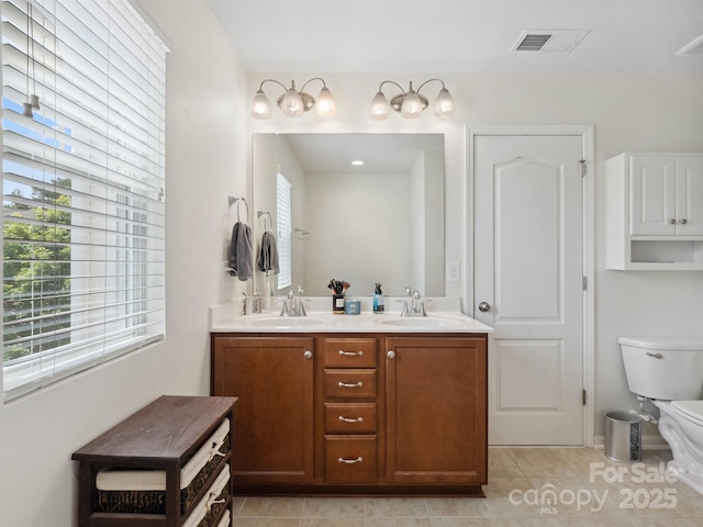 3306 Yarmouth Ln, Gastonia, NC 28056 - bathroom featuring double vanity and tile patterned flooring