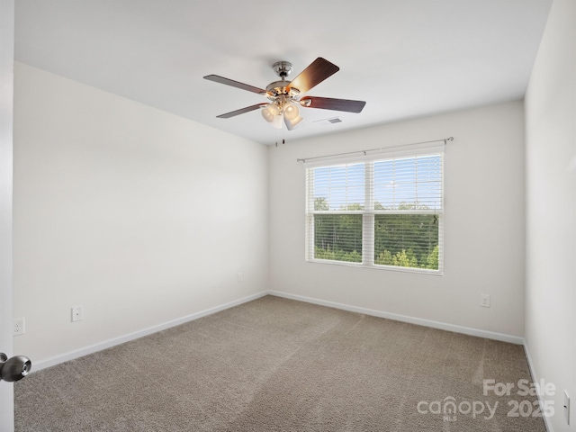 3306 Yarmouth Ln, Gastonia, NC 28056 - carpeted spare room featuring baseboards and a ceiling fan