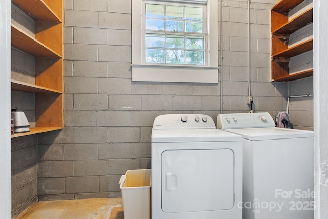 713 Crozet St NW, Valdese, NC 28690 - washroom with concrete block wall and washer and dryer