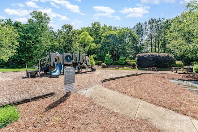 10322 Stoneykirk Ln, Charlotte, NC 28269 - communal playground with view of wooded area