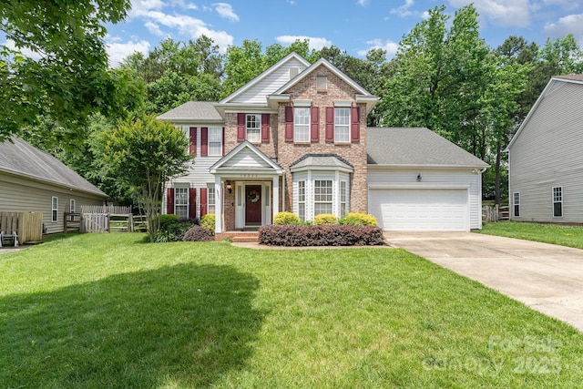 10322 Stoneykirk Ln, Charlotte, NC 28269 - view of front facade with brick siding, driveway, an attached garage, and roof with shingles