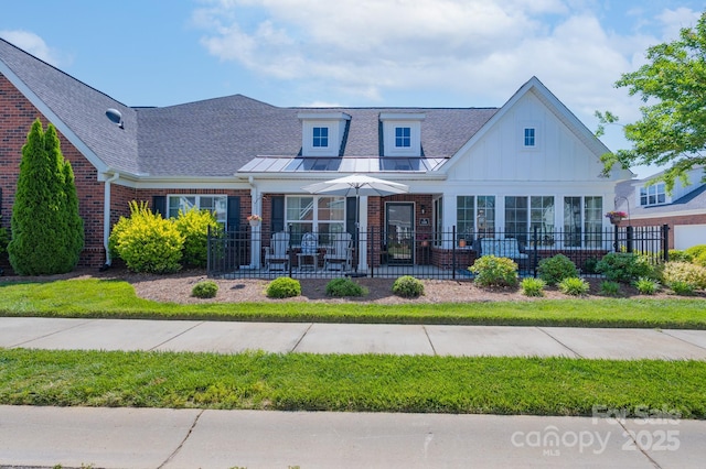 148 Adelaide Way, Rock Hill, SC 29732 - view of front of house with brick siding, fence, and roof with shingles