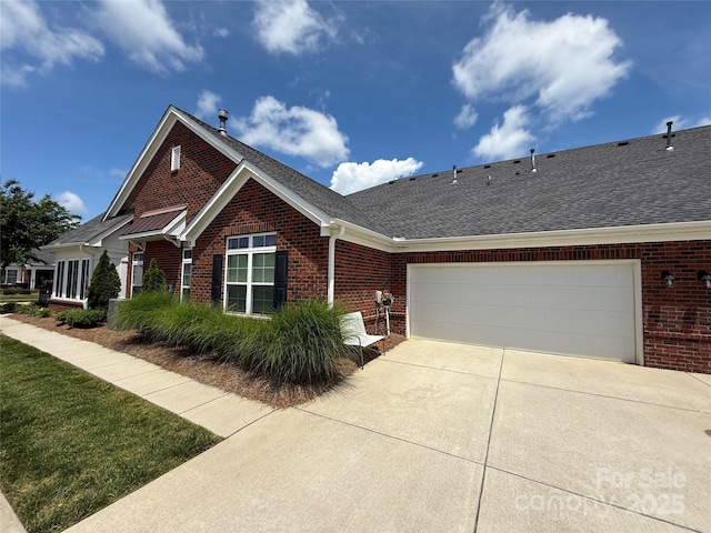 148 Adelaide Way, Rock Hill, SC 29732 - view of front facade featuring brick siding, concrete driveway, a garage, and roof with shingles