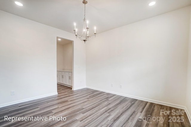 2233 Tabor Rd Unit 586, Sherrills Ford, NC 28673 - empty room with wood finished floors, a chandelier, baseboards, and recessed lighting