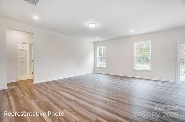 2233 Tabor Rd Unit 586, Sherrills Ford, NC 28673 - unfurnished room with light wood-style floors, baseboards, and recessed lighting