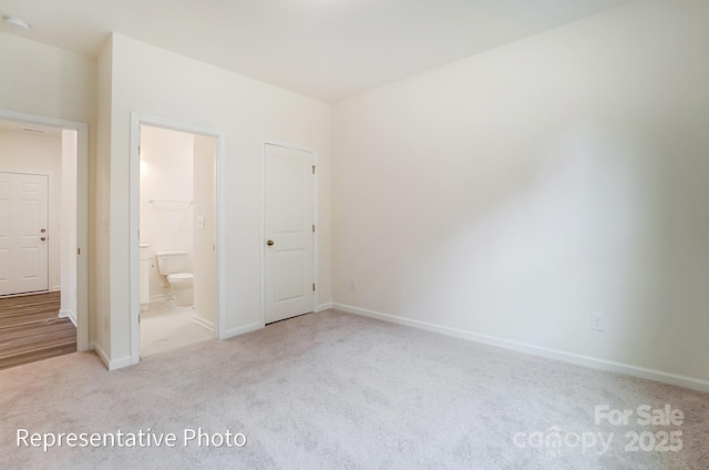 2233 Tabor Rd Unit 586, Sherrills Ford, NC 28673 - unfurnished bedroom with carpet floors, ensuite bath, and baseboards