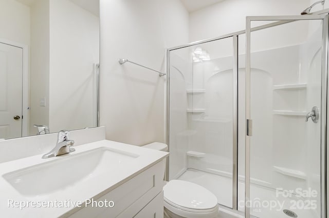 2233 Tabor Rd Unit 586, Sherrills Ford, NC 28673 - full bathroom featuring a shower stall, toilet, and vanity