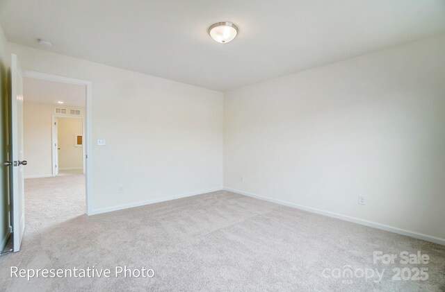 2233 Tabor Rd Unit 586, Sherrills Ford, NC 28673 - carpeted empty room featuring baseboards and a smoke detector