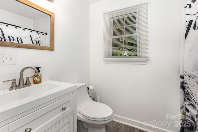 875 Marys Grove Rd, Cherryville, NC 28021 - bathroom with vanity, baseboards, wood finished floors, and toilet