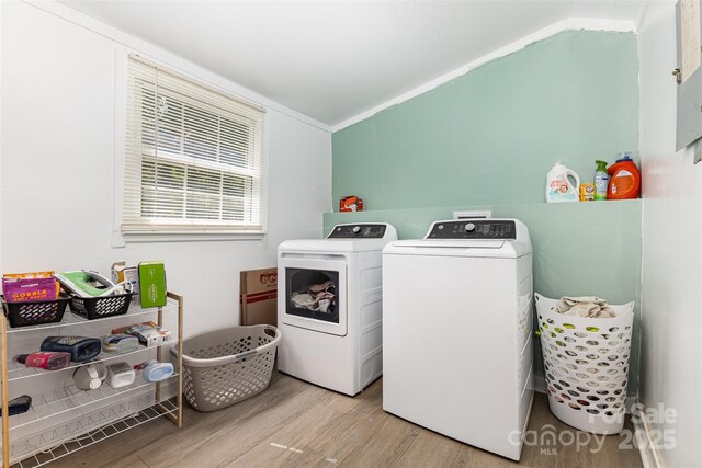 875 Marys Grove Rd, Cherryville, NC 28021 - laundry area with wood finished floors, independent washer and dryer, and ornamental molding
