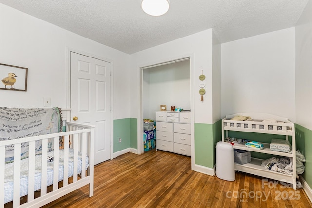 875 Marys Grove Rd, Cherryville, NC 28021 - bedroom with wood finished floors, baseboards, and a textured ceiling