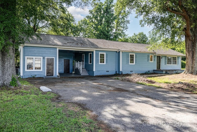 875 Marys Grove Rd, Cherryville, NC 28021 - ranch-style home with crawl space, driveway, an attached carport, and roof with shingles