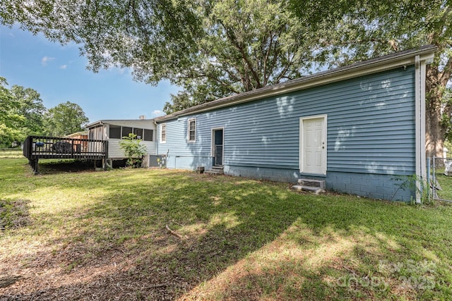875 Marys Grove Rd, Cherryville, NC 28021 - rear view of house with entry steps, a sunroom, a yard, and a wooden deck