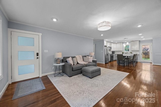 4106 Castlewood Rd, Charlotte, NC 28209 - living area featuring dark wood finished floors, baseboards, crown molding, and recessed lighting
