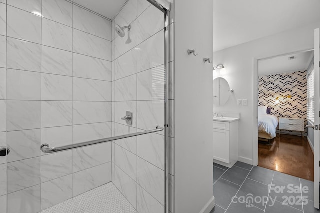 4106 Castlewood Rd, Charlotte, NC 28209 - full bath with a shower stall, tile patterned floors, ensuite bathroom, and vanity