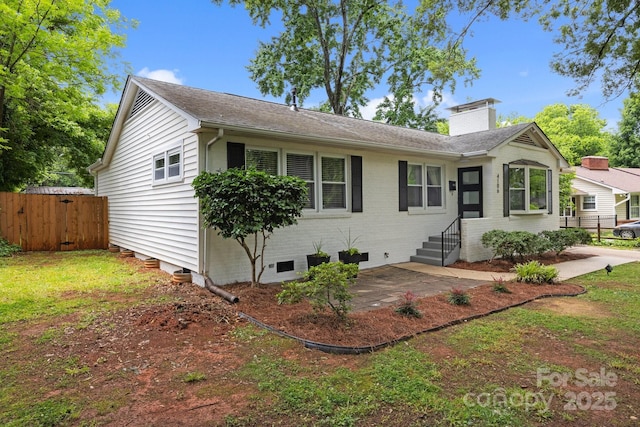 4106 Castlewood Rd, Charlotte, NC 28209 - single story home with a chimney, a patio area, brick siding, and a shingled roof