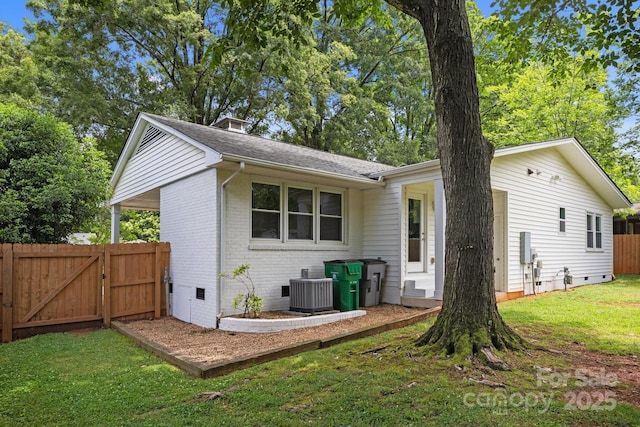4106 Castlewood Rd, Charlotte, NC 28209 - back of house with crawl space, a gate, brick siding, central AC unit, and roof with shingles