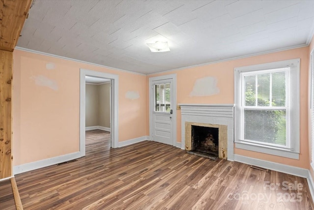 24515 Saint Martin Rd, Albemarle, NC 28001 - unfurnished living room with crown molding, a brick fireplace, baseboards, and wood finished floors
