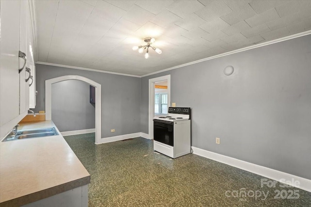 24515 Saint Martin Rd, Albemarle, NC 28001 - kitchen with white range with electric cooktop, arched walkways, a sink, crown molding, and baseboards