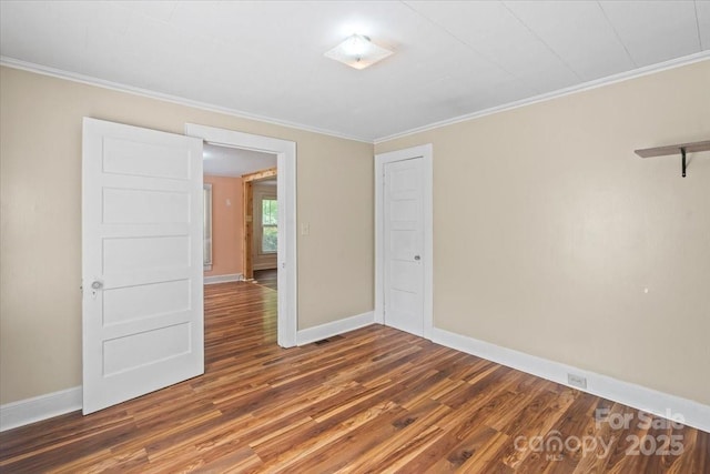 24515 Saint Martin Rd, Albemarle, NC 28001 - unfurnished room with wood finished floors, crown molding, and baseboards