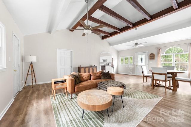 3716 Hamilton Dr, Gastonia, NC 28052 - living area with a ceiling fan, arched walkways, wood finished floors, and baseboards