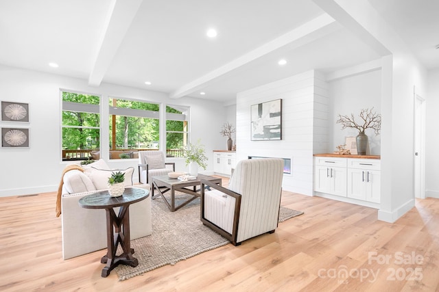 104 Arbor Dr, Waxhaw, NC 28173 - living room featuring beam ceiling, light wood-style floors, and recessed lighting