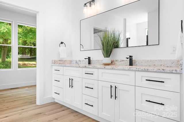 104 Arbor Dr, Waxhaw, NC 28173 - full bathroom with double vanity and wood finished floors