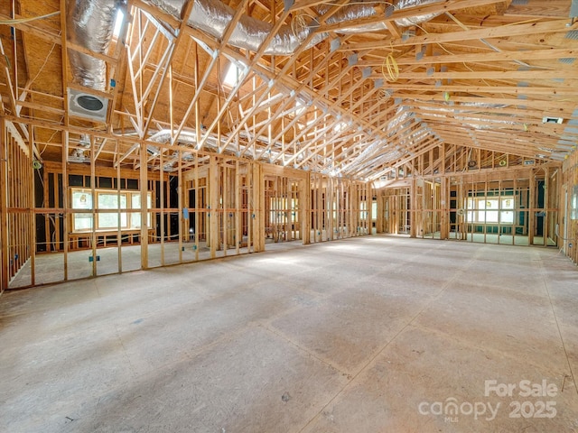 miscellaneous room featuring lofted ceiling