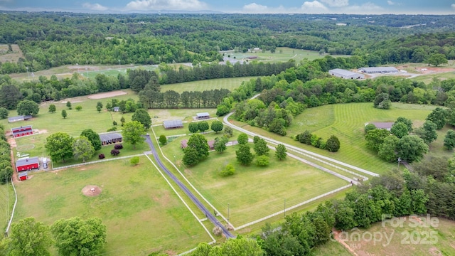 overview of rural landscape with a heavily wooded area