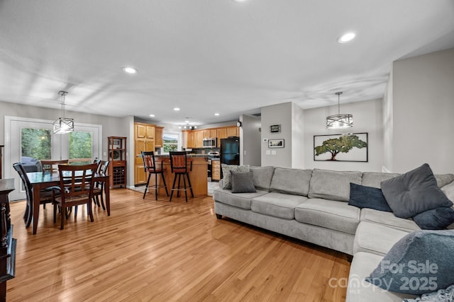 931 Indian Hill Rd, Hendersonville, NC 28791 - living room featuring light wood-style floors, recessed lighting, and plenty of natural light