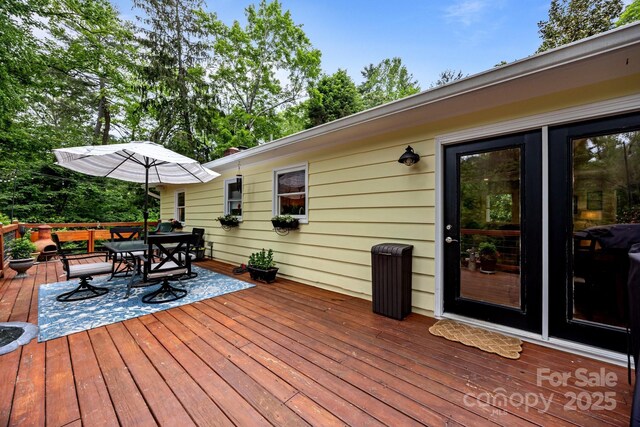 931 Indian Hill Rd, Hendersonville, NC 28791 - wooden terrace with outdoor dining area