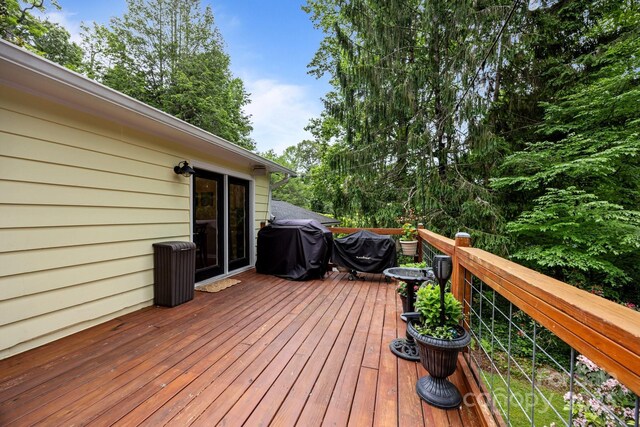 931 Indian Hill Rd, Hendersonville, NC 28791 - wooden deck with a grill