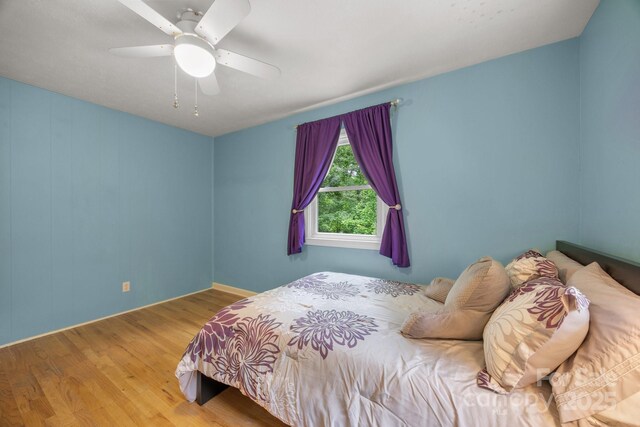 931 Indian Hill Rd, Hendersonville, NC 28791 - bedroom with wood finished floors and ceiling fan