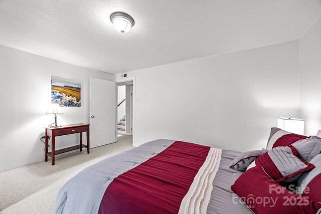 931 Indian Hill Rd, Hendersonville, NC 28791 - carpeted bedroom featuring a textured ceiling