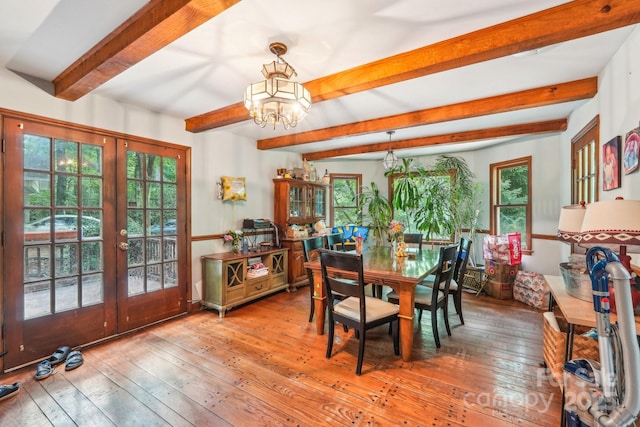 8504 Knollwood Cir, Charlotte, NC 28213 - dining room featuring french doors, beamed ceiling, a chandelier, and hardwood / wood-style flooring