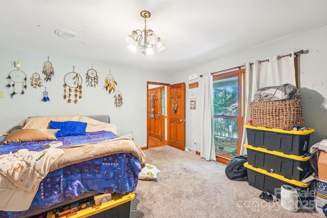 8504 Knollwood Cir, Charlotte, NC 28213 - carpeted bedroom with access to outside, a chandelier, and baseboards