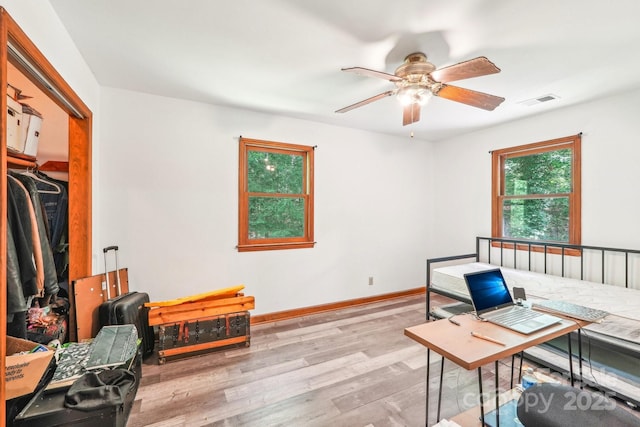 8504 Knollwood Cir, Charlotte, NC 28213 - office space featuring wood finished floors, a ceiling fan, and baseboards