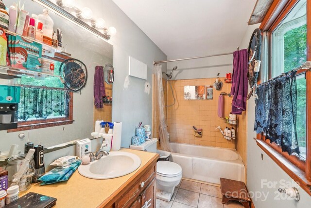 8504 Knollwood Cir, Charlotte, NC 28213 - full bathroom featuring vanity, tile patterned floors, shower / tub combo with curtain, and toilet
