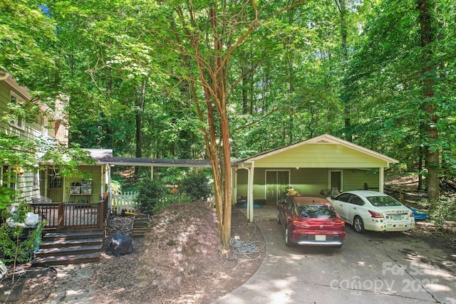 8504 Knollwood Cir, Charlotte, NC 28213 - view of front of home with a wooden deck and a wooded view
