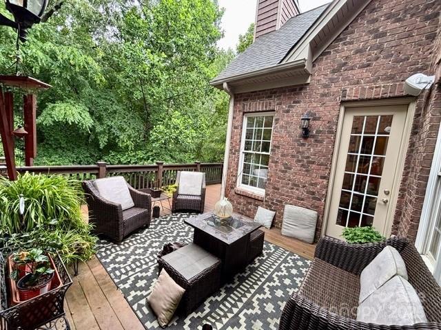5826 Natoma Rd, Lake Wylie, SC 29710 - wooden deck with outdoor lounge area