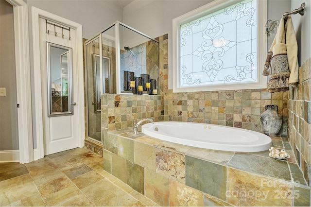 5826 Natoma Rd, Lake Wylie, SC 29710 - full bathroom with a bath, a shower stall, and stone tile flooring