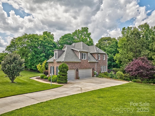 5826 Natoma Rd, Lake Wylie, SC 29710 - view of home's exterior with brick siding, a lawn, driveway, an attached garage, and roof with shingles